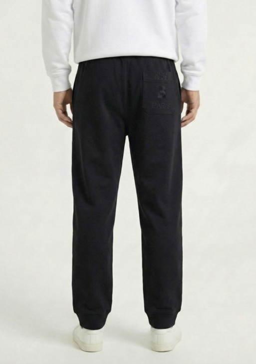 بنطال قطني أسود "أوفر سايز" بأطراف مطاطية (Cuffed)